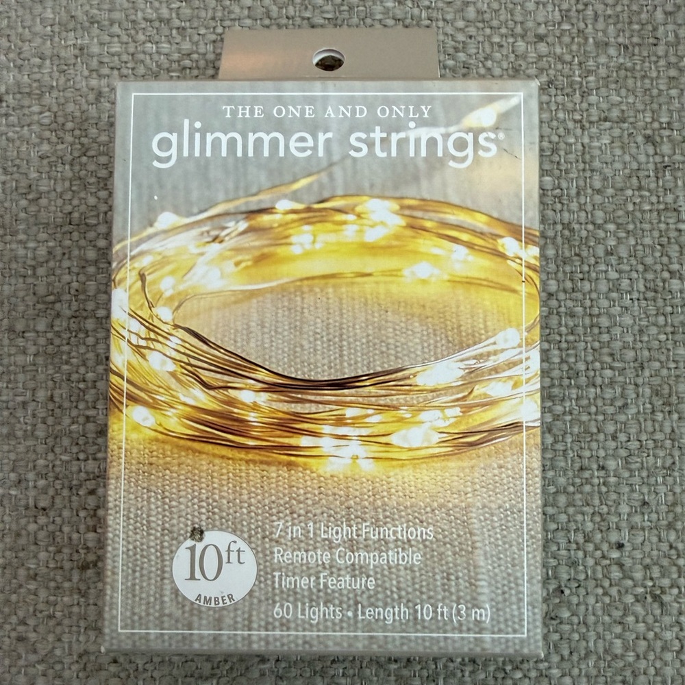 NIB Pier 1 Exclusive Glimmer Lights 10 ft Timer Auto Shut Off.